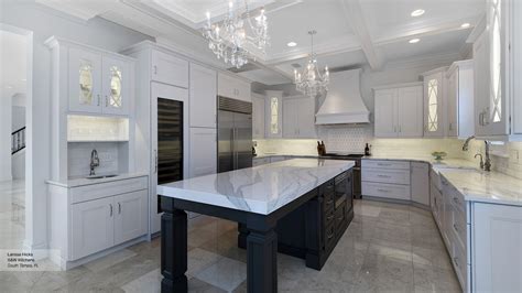 Espresso kitchen cabinets with white island. White Kitchen Cabinets with a Dark Grey Island - Omega
