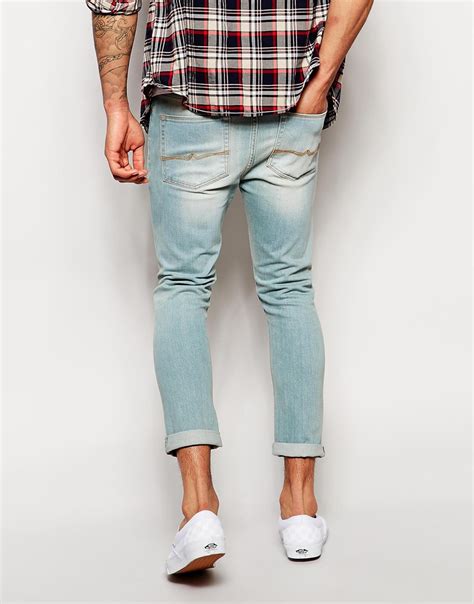 Browse skinny, super skinny, and stacked skinny jeans in light and dark washes today. Lyst - Asos Super Skinny Jeans Ankle Grazer In Light Wash in Blue for Men