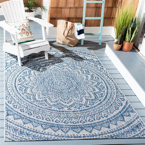Getting a durable rug that can hang in the sun during the summer and shine in your home in colder weather lets you make use of one great piece no matter the space or season. Safavieh Courtyard Circin Indoor Outdoor Medallion Area ...