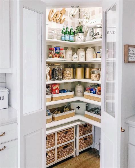 This turntable shelf can be used to hold spices, dry ingredients, or smaller appliances you use often. A beautiful modern corner pantry. #modernpantry # ...
