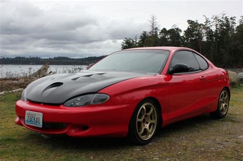 Nothing has changed on the tiburon for 1999, but all hyundai customers will be delighted with the company's new buyer assurance program, called the hyundai advantage. 2011 April - June Featured Ride | 1999 Hyundai Tiburon ...