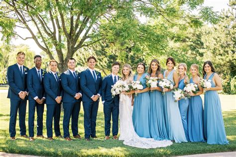 Large Wedding Party In Dusty Blue And Navy Summer Wedding Colors