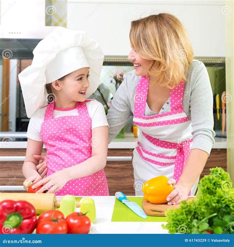 Smiling Young Mother With Daughter Cooking Stock Image Image Of Cooking Healthy 61743229