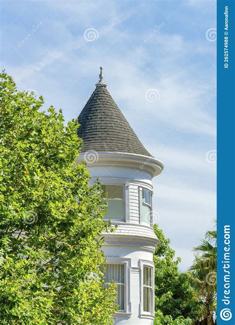 House Or Home Spire With Bright Front Yard Trees And Foliage With Round