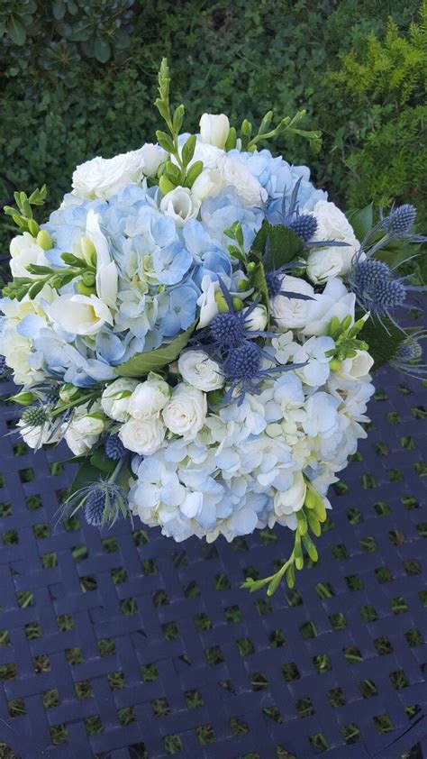 Light Blue Hydrangea Blue Thistle And White Spray Rose Bridal Bouquet