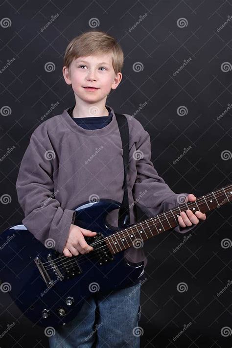 Young Boy Playing Guitar Stock Photo Image Of Guitar 15329838