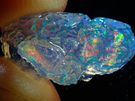 576ct Water Opal With Play Of Colour Bright Carved