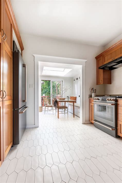 Choose from a wide range of mosaic patterns using traditional hexagon, penny round, rectangle, and square shapes mesh mounted in one foot squares. Updated Kitchen Flooring | Kitchen flooring, Hexagon tile ...
