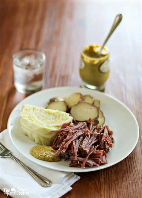 Start by adding some aromatics to the base of your slow cooker: Corned Beef and Cabbage - The Magical Slow Cooker