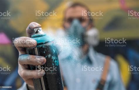 Graffiti Artist With Spray Paint Stock Photo Download Image Now