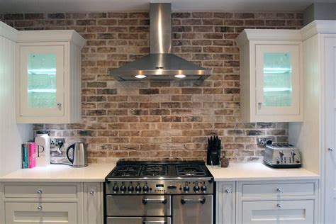 The use of white brick backsplash in the kitchen also can be supported by using black hanger to contrast the color of wall and the other utensils. Red Brick In The Kitchen | Gambrick