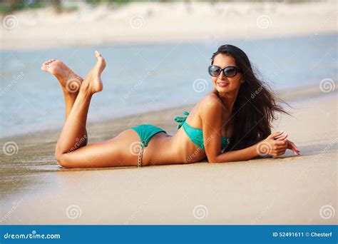 Tanned Brunette Laying On The Beach Stock Image Image Of Bikini
