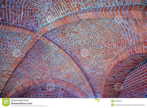 The barrel vault—also called a tunnel vault or wagon vault—is an arched, half cylindrical vault dating back to ancient egypt, though. Vaulted Brick Ceiling Stock Photo - Image: 38965027 ...