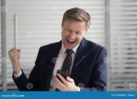 Lucky Happy Investor Or Trader Celebrating Profit Deal Stock Photo