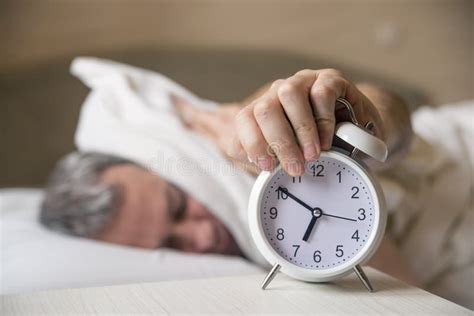 Sleeping Man Disturbed By Alarm Clock Early Morning Sleepy Man