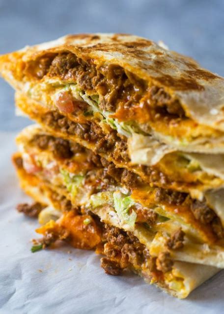 Lay one of the tortillas on a flat surface and spread the nacho cheese in the middle. Homemade Beef CrunchWraps | Mexican food recipes, Homemade ...