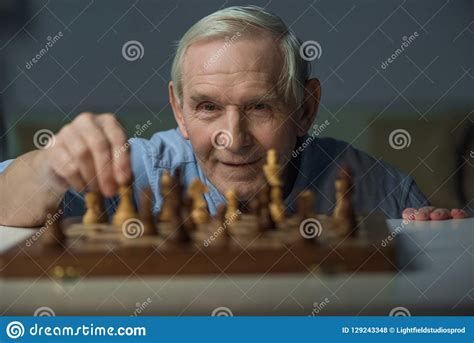 Senior Smiling Man Playing Chess Stock Photo Image Of Strategy Hobby