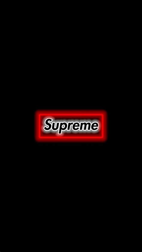 The Supreme Logo Is Lit Up On A Black Background With Red And White