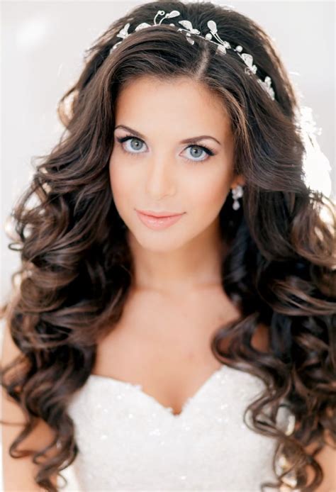 In this hairstyle for girls with long hair the hair is heavily layered around the face with bare layers at the back and ends. Wedding Hairstyles for Long Hair