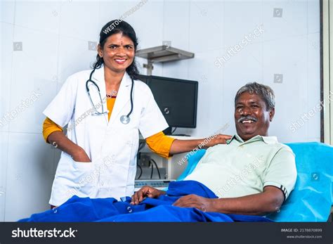 Happy Smiling Caring Friendly Doctor Hospitalized Stock Photo