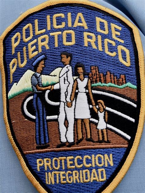 Puerto Rico Cop Held In Killing Of 3 Officers