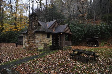 It has a bedroom downstairs with a queen bed, upstairs bedroom has a full bed with open loft overlooking kitchen and living room area, bathroom downstairs with standup shower. Watoga State Park Cabins - dorkaandthefashion