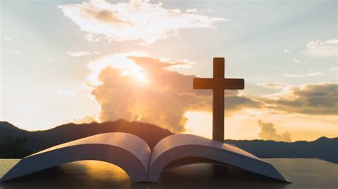 Bible Cross On Table In White Clouds Blue Sky Background Hd Christian Wallpapers Hd Wallpapers