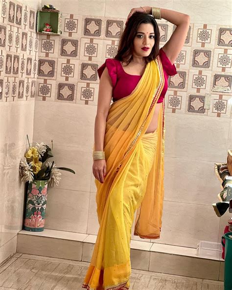 Monalisa Flaunts Her Sexy Back In Red Blouse With Yellow Saree See New Hot Photos