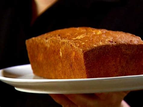Place a slice of pound cake on top of the melted ice cream and sprinkle the slice with a line of fresh raspberries. Plain Pound Cake Recipe | Ina Garten | Food Network