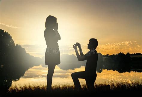 Wedding Proposal Concept Young Couple Have Dating At Sun Set Stock