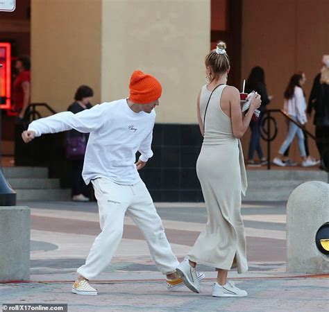 Justin Bieber Gets Flirty As He Playfully Grabs Wife Hailey Baldwins Rear During Outing