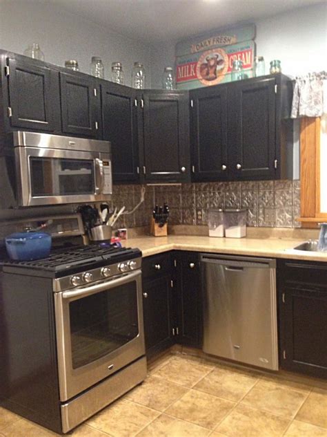Kitchen cabinet refacing | kitchen magic. Kitchen Cabinets in Black Gel Stain | Stained kitchen ...