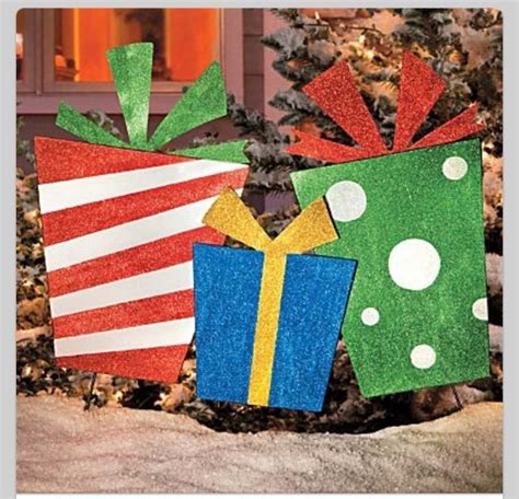 White cutouts christmas decorations outdoor ideas. Presents cutouts | Outdoor christmas presents, Christmas ...