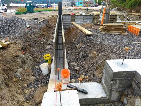 An alternative foundation strengthening method, which uses the brick wall acting together with tie beams provided at damp proof course level and window sill level, is presented. Ask the Builder: Poured or block, concrete walls need ...