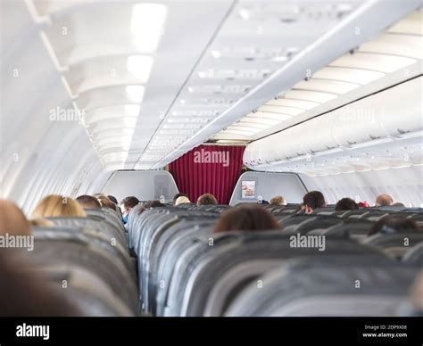 Die Welt Der Flugzeuge Passagiere In Der Kabine Von Ein Flugzeug