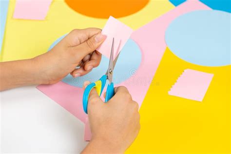 Kid Hands Cutting Colored Paper With Scissors Education Learning