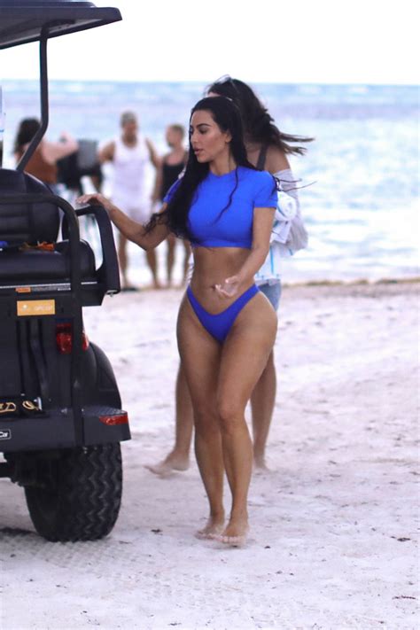 Kim Kardashian Shows Off Her Sensational Curves In A Blue Bikini During