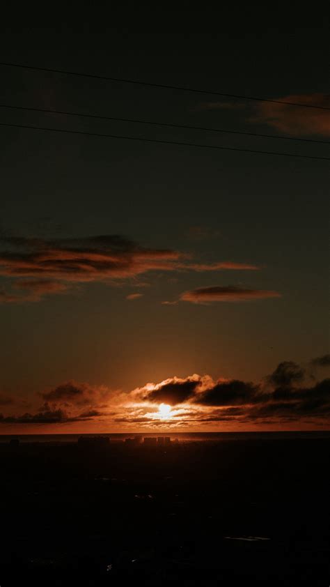Download Wallpaper 1350x2400 Sunset Dark Dusk Clouds Horizon Iphone