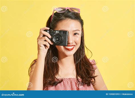 A Young Asian Woman Photographer Holding Film Camera Stock Image