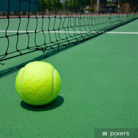 Discover 1 tenisball design on dribbble. tennis ball on green old court Wall Mural • Pixers® • We ...