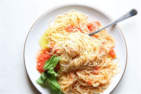 Flour chicken breast halves and pan fry in one tablespoon extra virgin olive oil about 7 minutes per side until golden brown. Best Angel Hair Pasta Pomodoro Recipe—How To Make Pasta ...