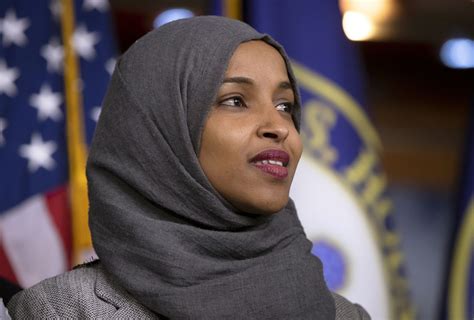 Omar wears a hijab, which according to the quran 33:59, tells women to cover so they won't get molested. Five myths about hijab - The Washington Post