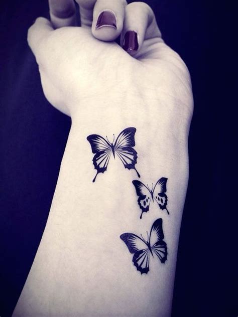 Discreet but with a strong meaning, it represents freedom, love, life and a new beginning. Small ink simple butterfly tattoo on wrist - Tattooimages.biz