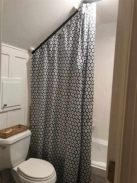 They can be straight or curved, and they mount depending on which shower rod you choose, your installation will be different. diy angled ceiling shower curtain rod - AMBLER HARMON ...