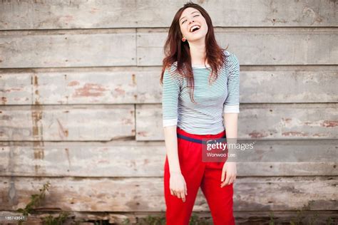 Portrait Of Young Woman Laughing Photo Getty Images