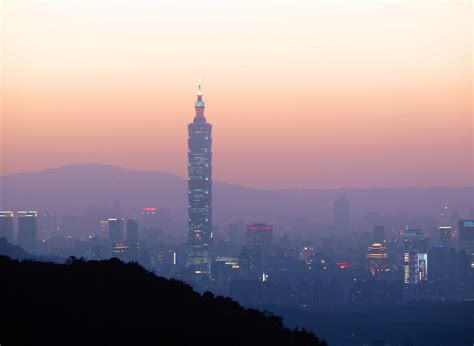 Taipei 101 At Dusk Under The Reddish Skies And Haze In Taiwan Image