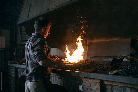 Blacksmith Heating Iron In Fire Stock Image Everypixel