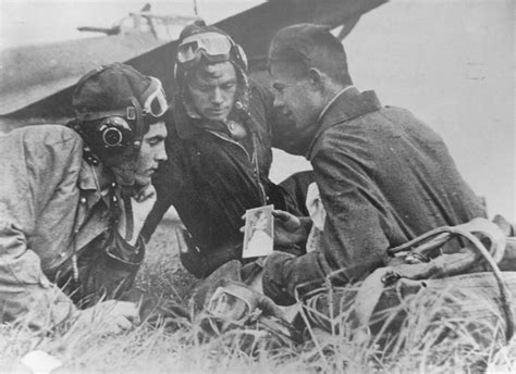 a soviet pilot showing the photo of his girlfriend 1944 r wwiipics