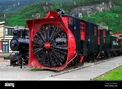 Railroad Yard White Pass Railroad Steam Engine And Giagantic Snow