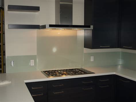 This window backsplash, while not a traditional mirror, serves all the functions of a mirrored kitchen wall. Backsplash Glass - Harbor All Glass & Mirror, Inc.